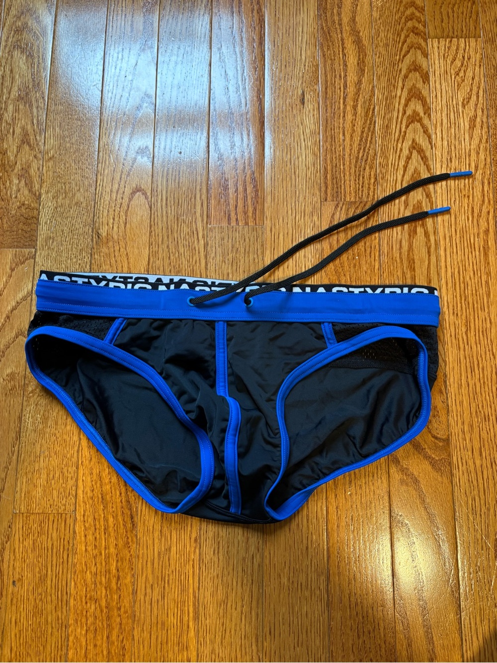 Nasty Pig Men's Swim Brief - Black + Blue
Mesh Panel and NASTYPIG Mock Band